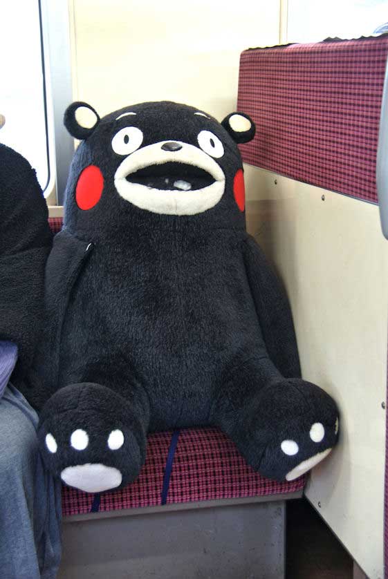 Kumamon, the mascot of Kumamoto, on a Kumamon themed train.