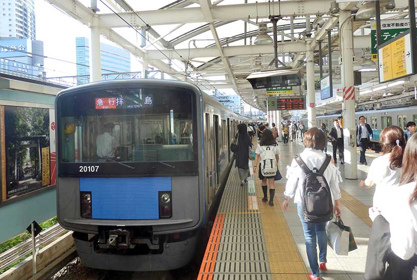 Express train bound for Haijima at Seibu Shinjuku Station.