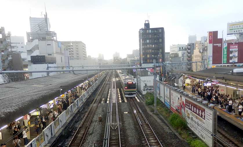 JR Saikyo Line train passing through Takadanobaba Station. 